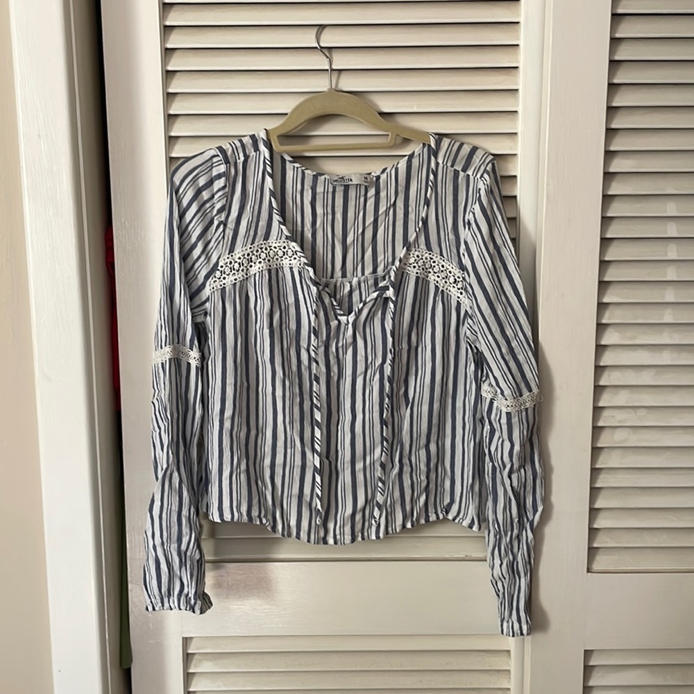 Navy blue and white striped long sleeve, from Hollister. Size M
